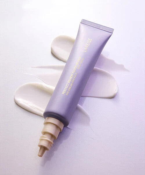 Purple skincare product with applicator on a light purple background