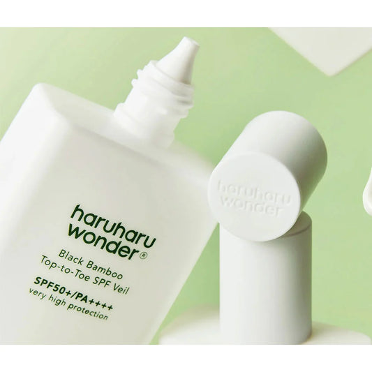 Haruharu Wonder Black Bamboo Top-to-Toe SPF Veil SPF50+ PA++++ – лек слънцезащитен продукт за лице и тяло с черен бамбук и хидратиращи съставки.